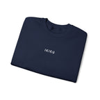 Folded navy sweatshirt with an IKIRU logo on a white background