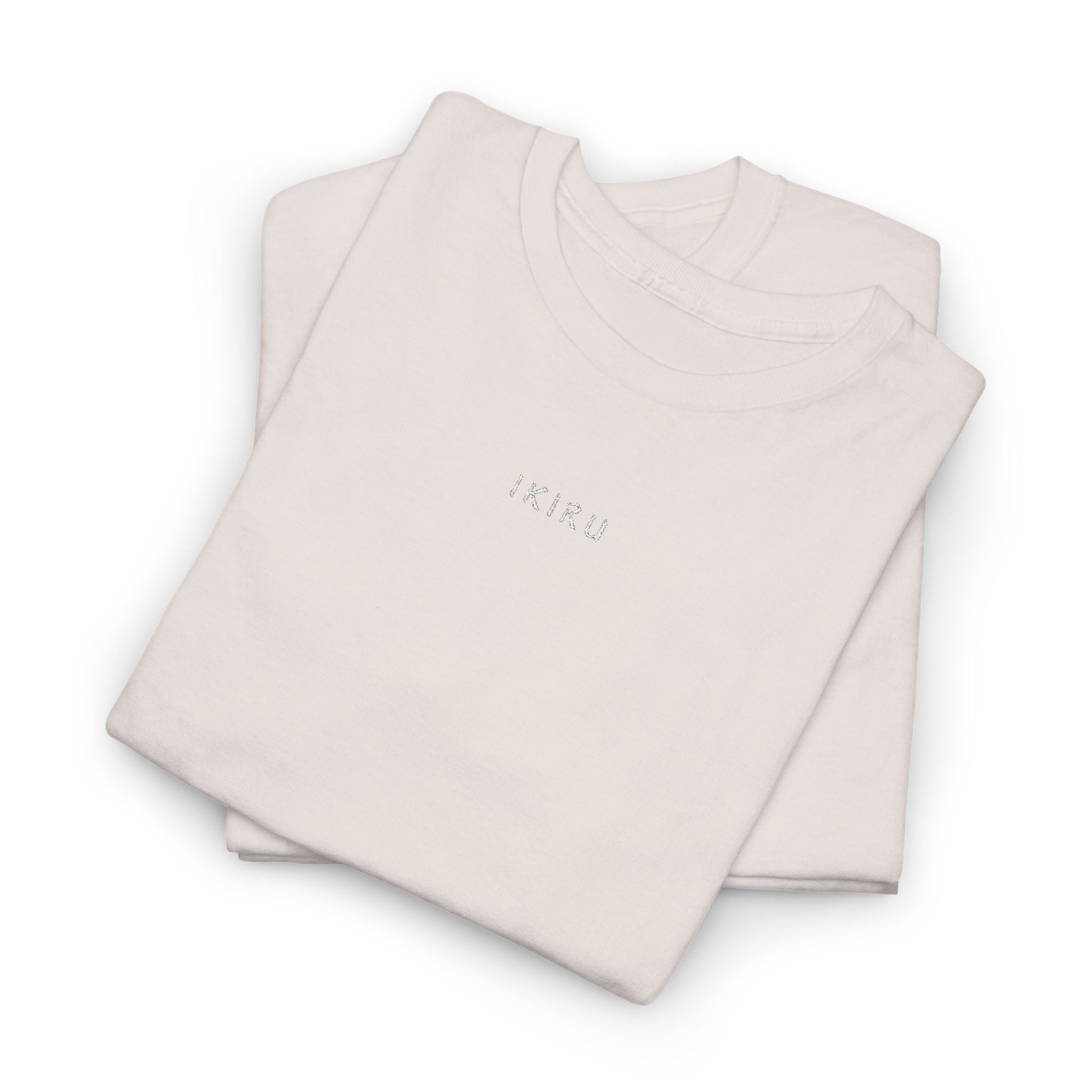 Folded Ice grey t-shirt with 'IKIRU' logo on a white background