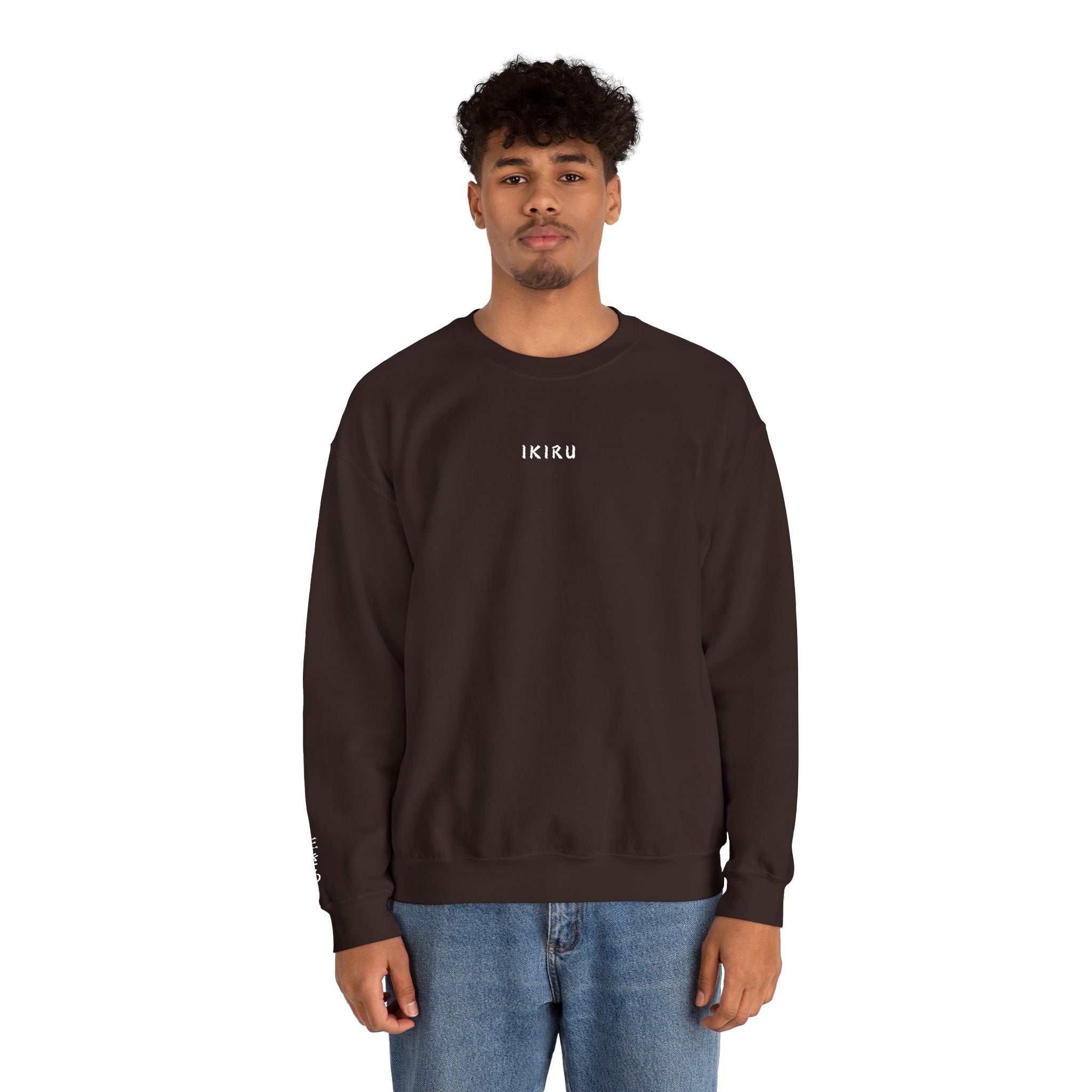 Man wearing a brown sweatshirt with IKIRU logo on a white background