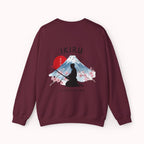 Maroon sweater with a mountain, samurai, and blossom tree design on the back saying 'un-influenceable' against a white background