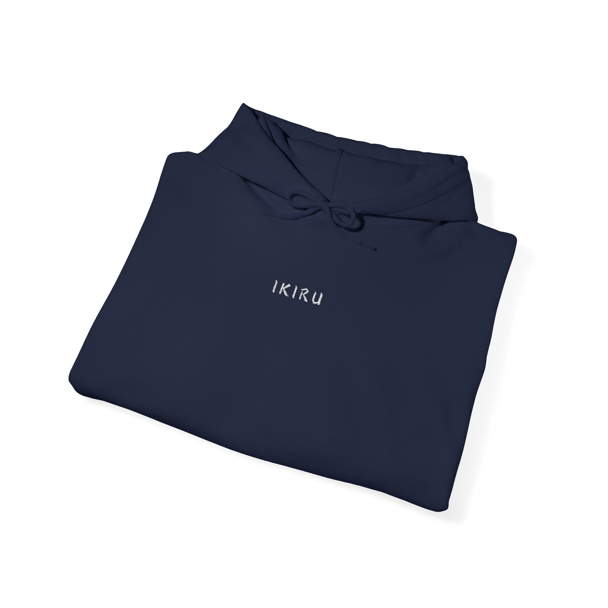 Folded navy hoodie with 'IKIRU' text on a white background