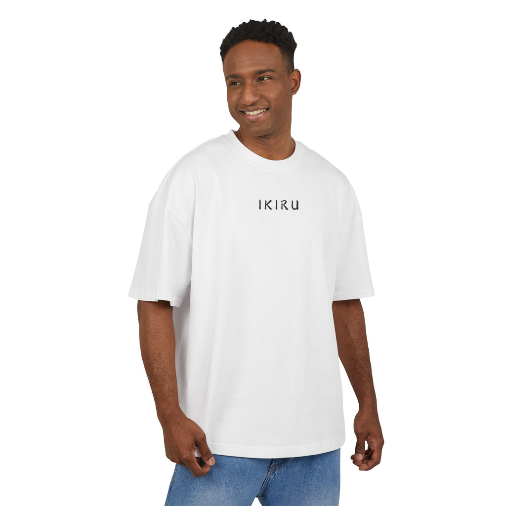 Man wearing a white t-shirt with a logo on a white background
