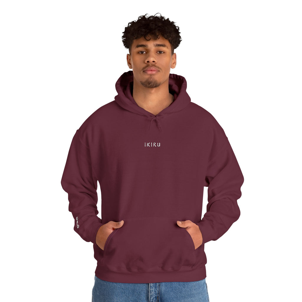 Person wearing a maroon hoodie with IKIRU logo on a white background