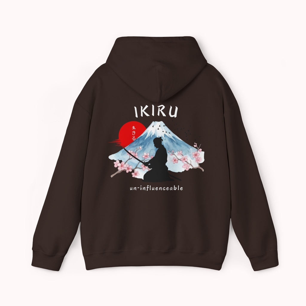 Brown hoodie with 'IKIRU' and mountain, samurai, and blossom tree design on the back saying 'un-influenceable' against a white background