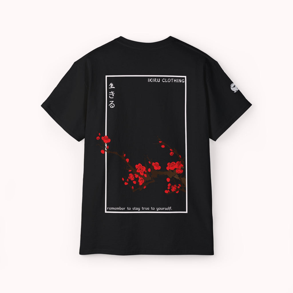 Black t-shirt with Japanese cherry blossom design from 'IKIRU CLOTHING' on a white background