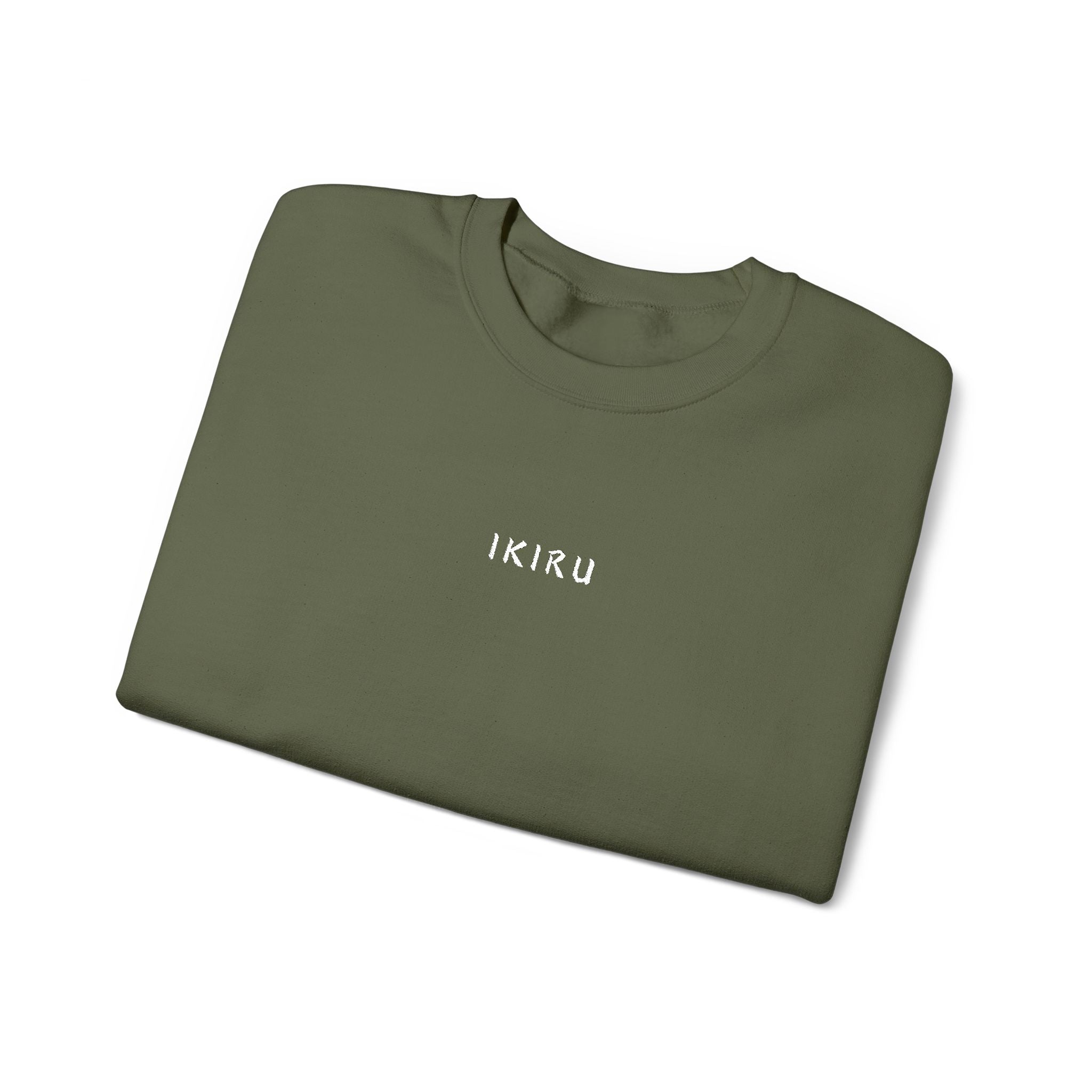Folded Green sweatshirt with an IKIRU logo on a white background