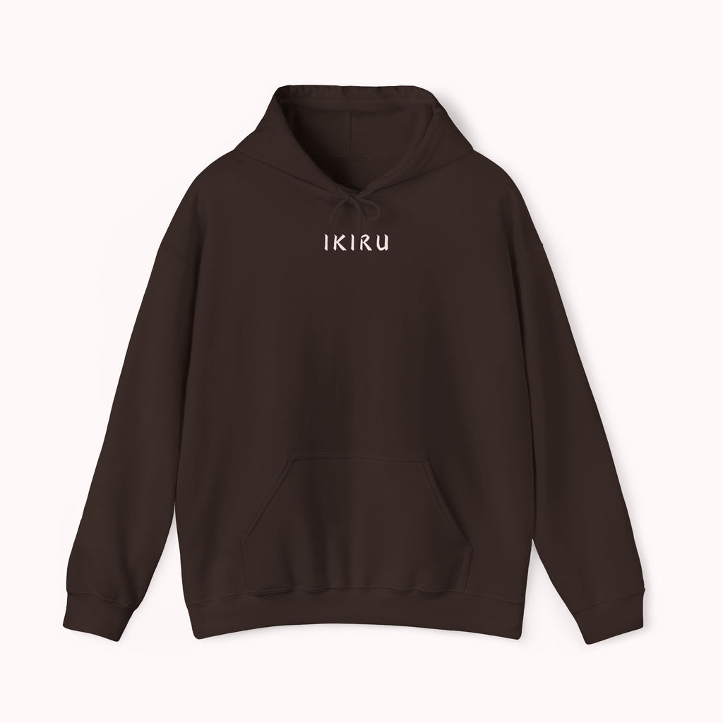Brown hoodie with 'IKIRU' and mountain, samurai, and blossom tree design on the back saying 'un-influenceable' against a white background