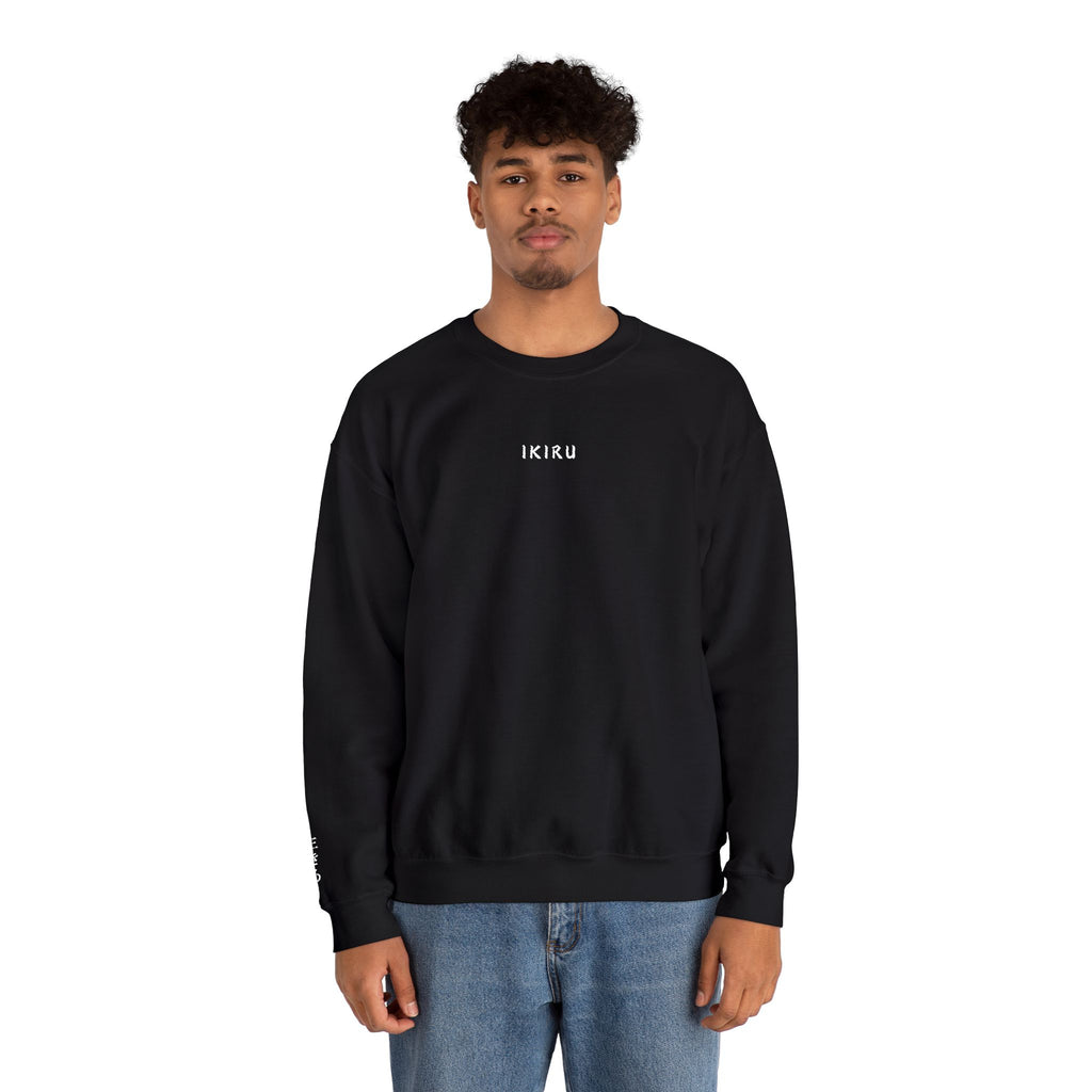 Person wearing a black sweatshirt with IKIRU logo on a white background