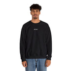 Person wearing a black sweatshirt with IKIRU logo on a white background