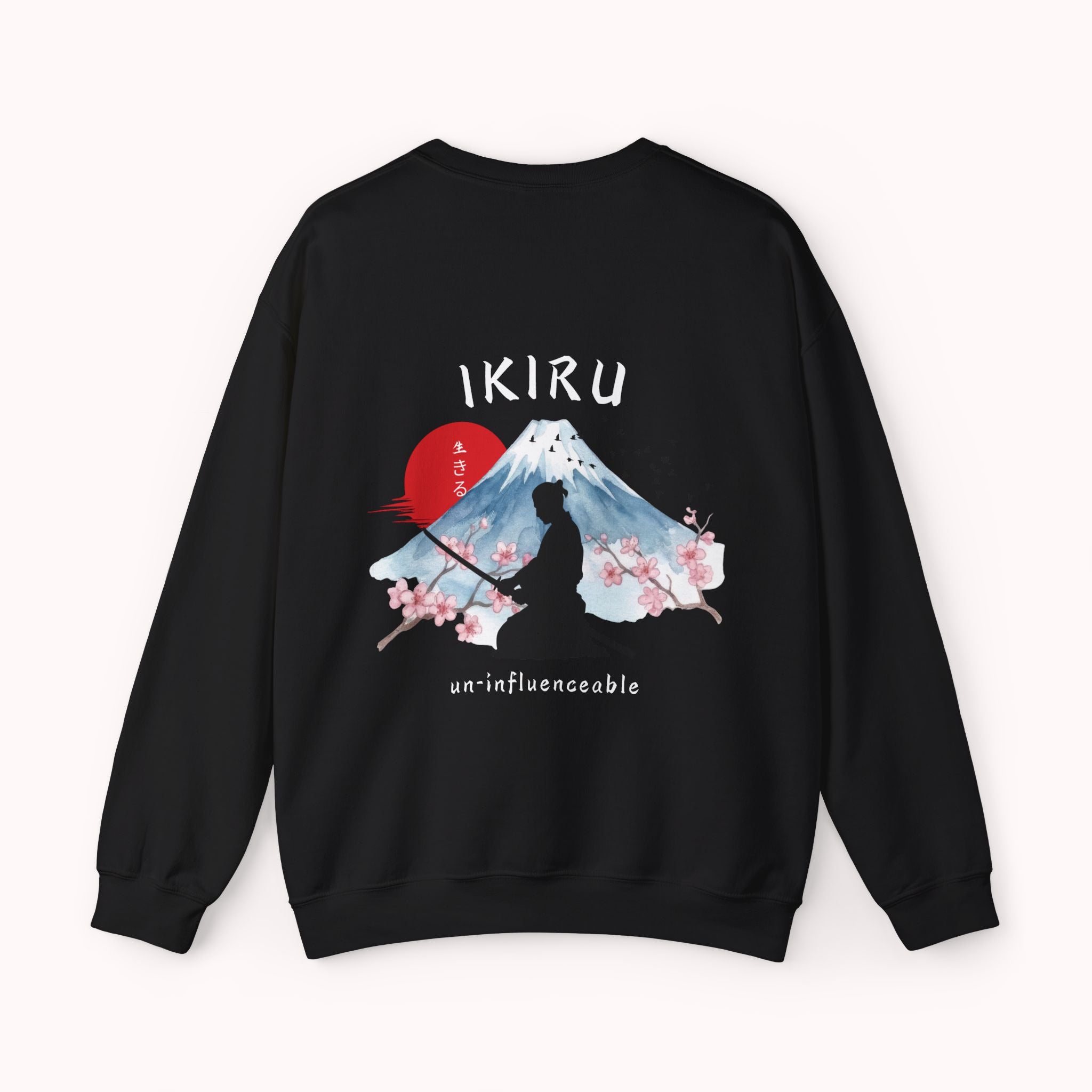 Black sweater with a mountain, samurai, and blossom tree design on the back saying 'un-influenceable' against a white background