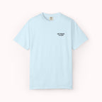 Light blue t-shirt with text on a white background