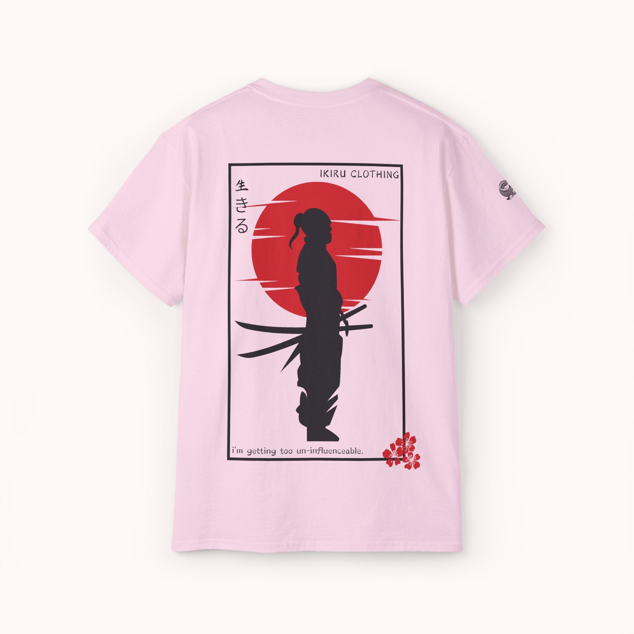 Pink t-shirt with a Japenese samurai and sun on the back from 'IKIRU CLOTHING' on a white background
