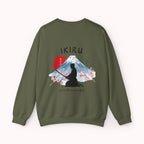 Green sweater with a mountain, samurai, and blossom tree design on the back saying 'un-influenceable' against a white background