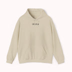Beige hoodie with 'IKIRU' and mountain, samurai, and blossom tree design on the back saying 'un-influenceable' against a white background
