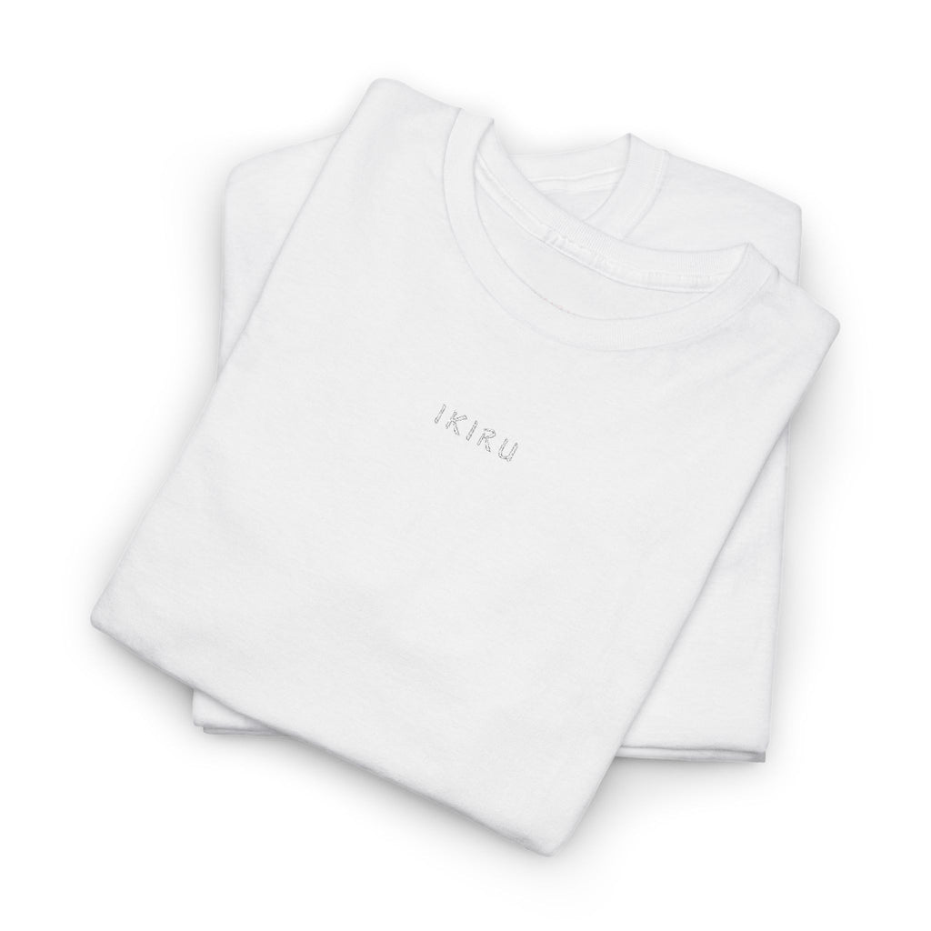 Folded white shirt with an IKIRU logo on a white background