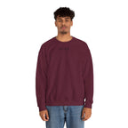 Man wearing a maroon sweatshirt with an ikiru logo on a white background