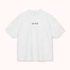 White t-shirt with 'IKIRU' logo on a white background