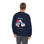 Man wearing navy sweater with a mountain, samurai, and blossom tree design on the back saying 'un-influenceable' against a white background