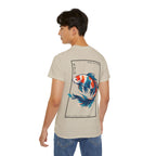 Person wearing a beige t-shirt with a colorful koi fish design and 'IKIRU CLOTHING' branding on a white background