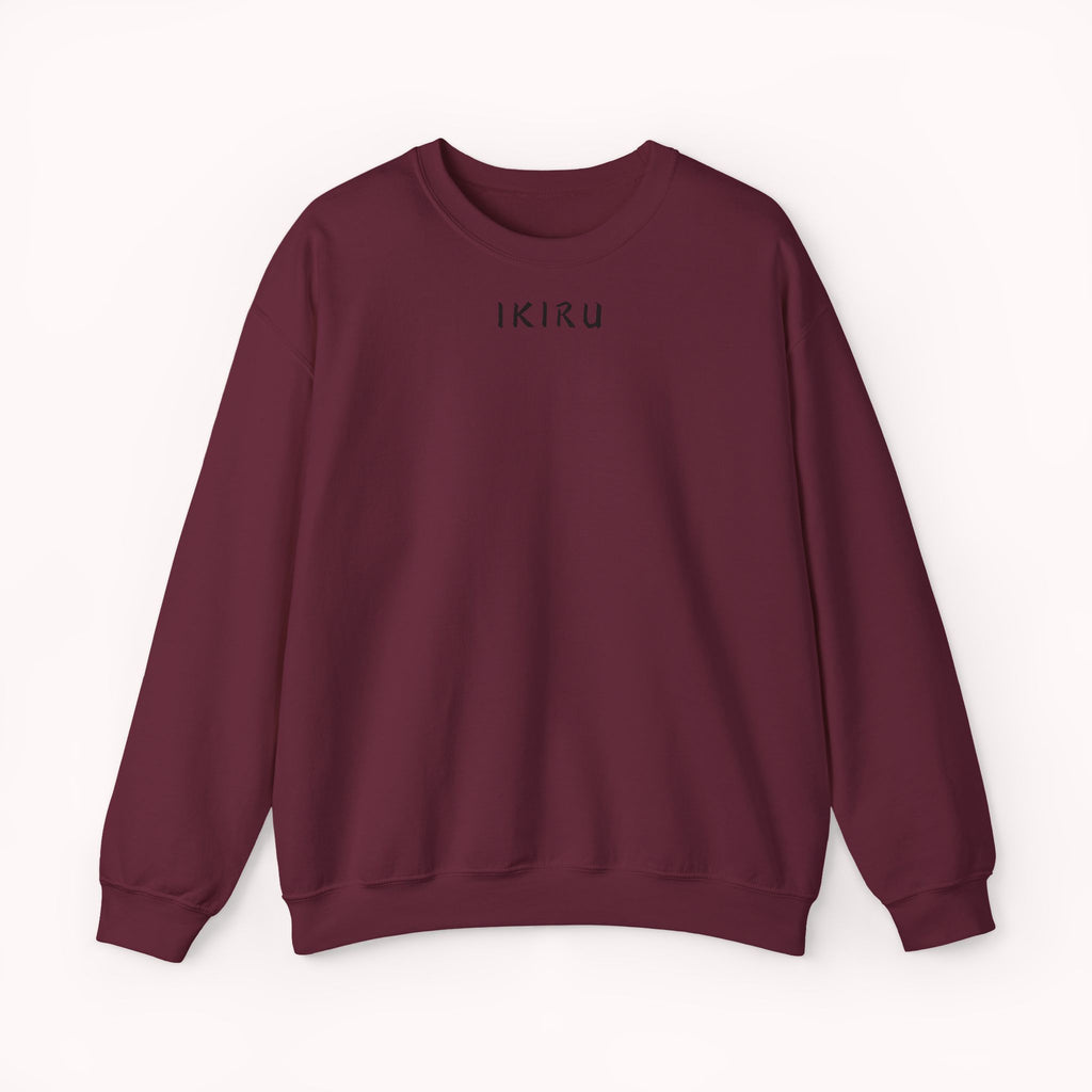 Maroon sweater with a small ikiru logo on the front