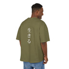 Man wearing a green t-shirt with white text on the back, standing against a white background