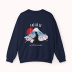 Navy sweater with a mountain, samurai, and blossom tree design on the back saying 'un-influenceable' against a white background