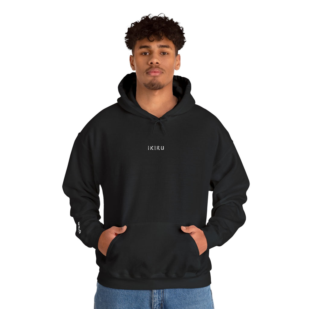 Person wearing black hoodie with IKIRU logo on a white background