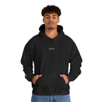 Person wearing black hoodie with IKIRU logo on a white background