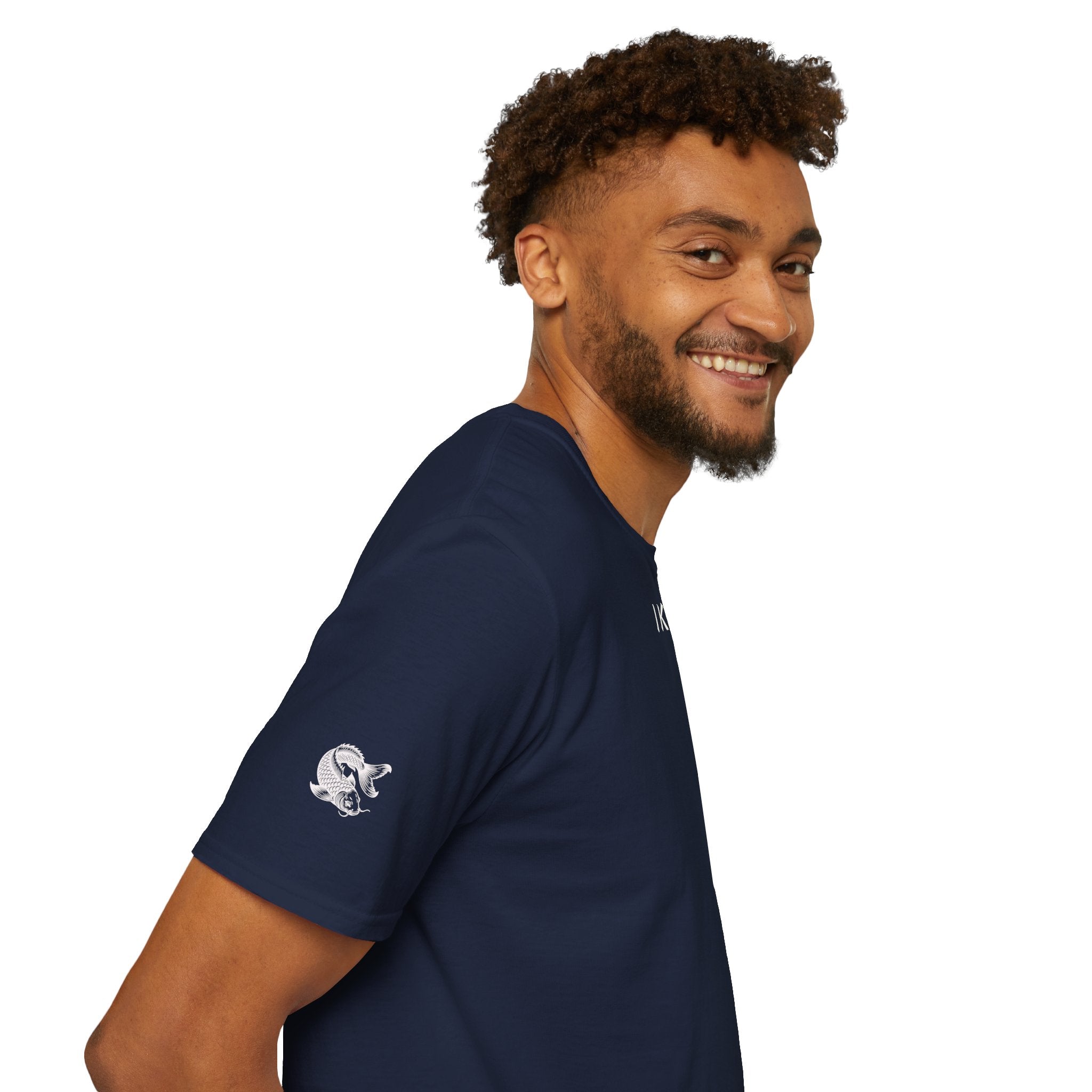 Man wearing a navy blue t-shirt with a logo on a white background