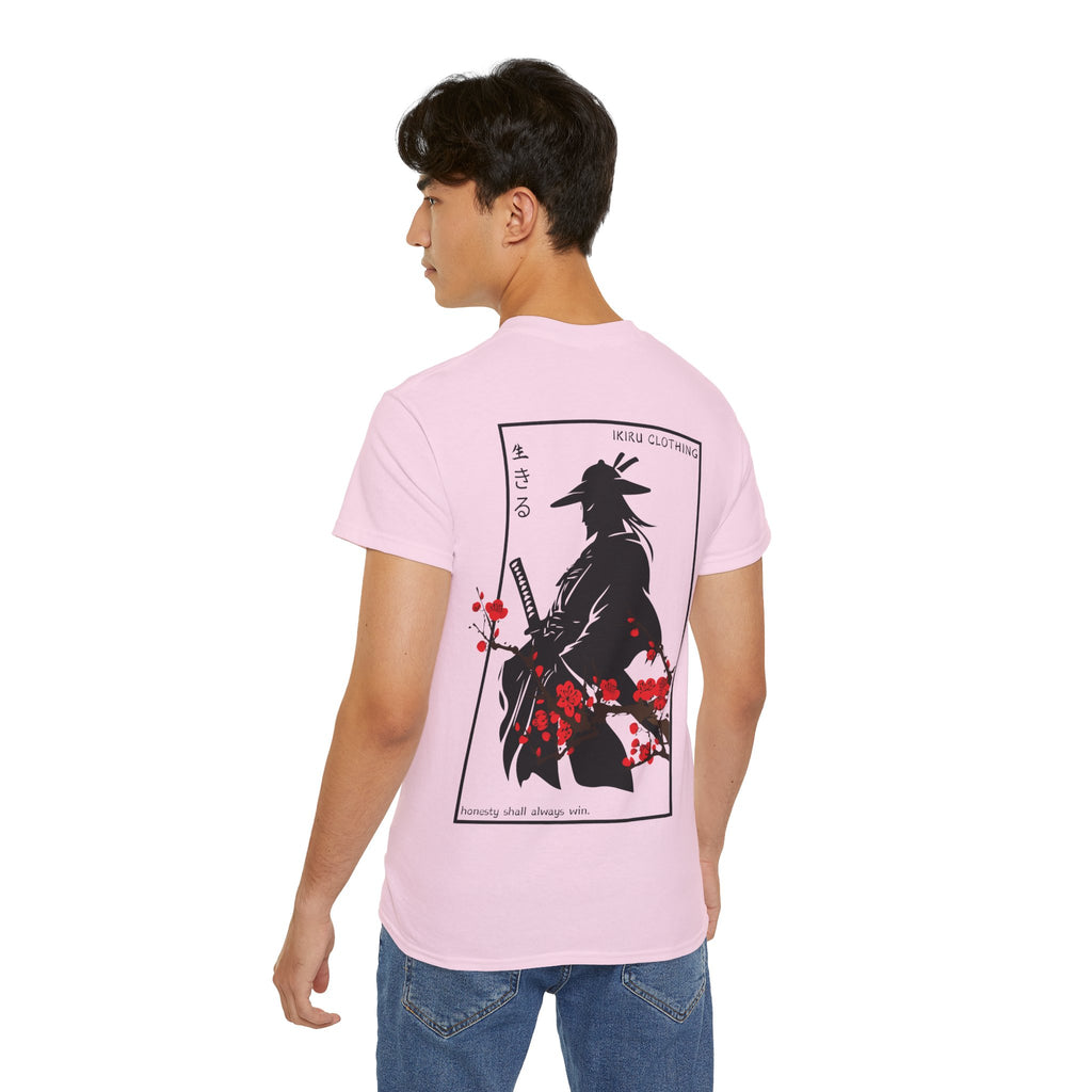 Person wearing a pink t-shirt with a japanese samurai and blossom graphic design from 'IKIRU CLOTHING' on a white background