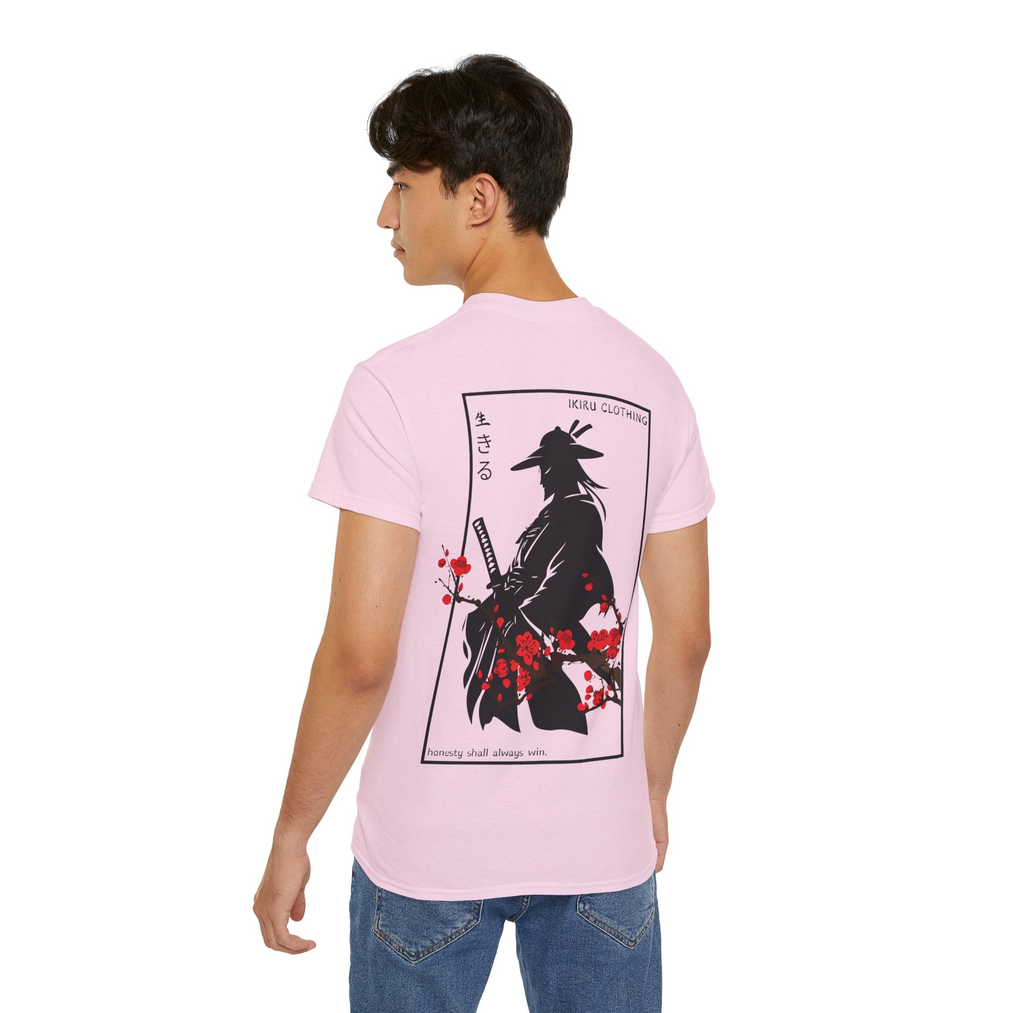 Person wearing a pink t-shirt with a japanese samurai and blossom graphic design from 'IKIRU CLOTHING' on a white background