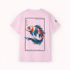 Pink t-shirt with a colorful koi fish design and 'IKIRU CLOTHING' branding on a white background