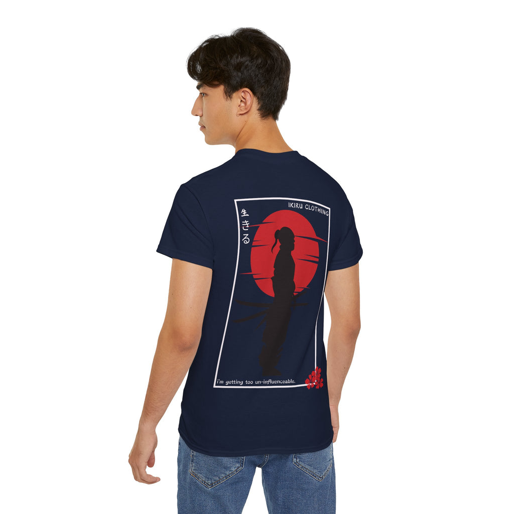 Person wearing a navy blue t-shirt with a graphic design on the back, standing against a white background.