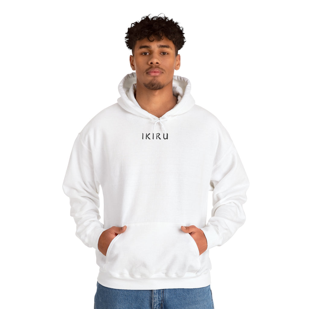 White hoodie with 'IKIRU' and mountain, samurai, and blossom tree design on the back saying 'un-influenceable' against a white background