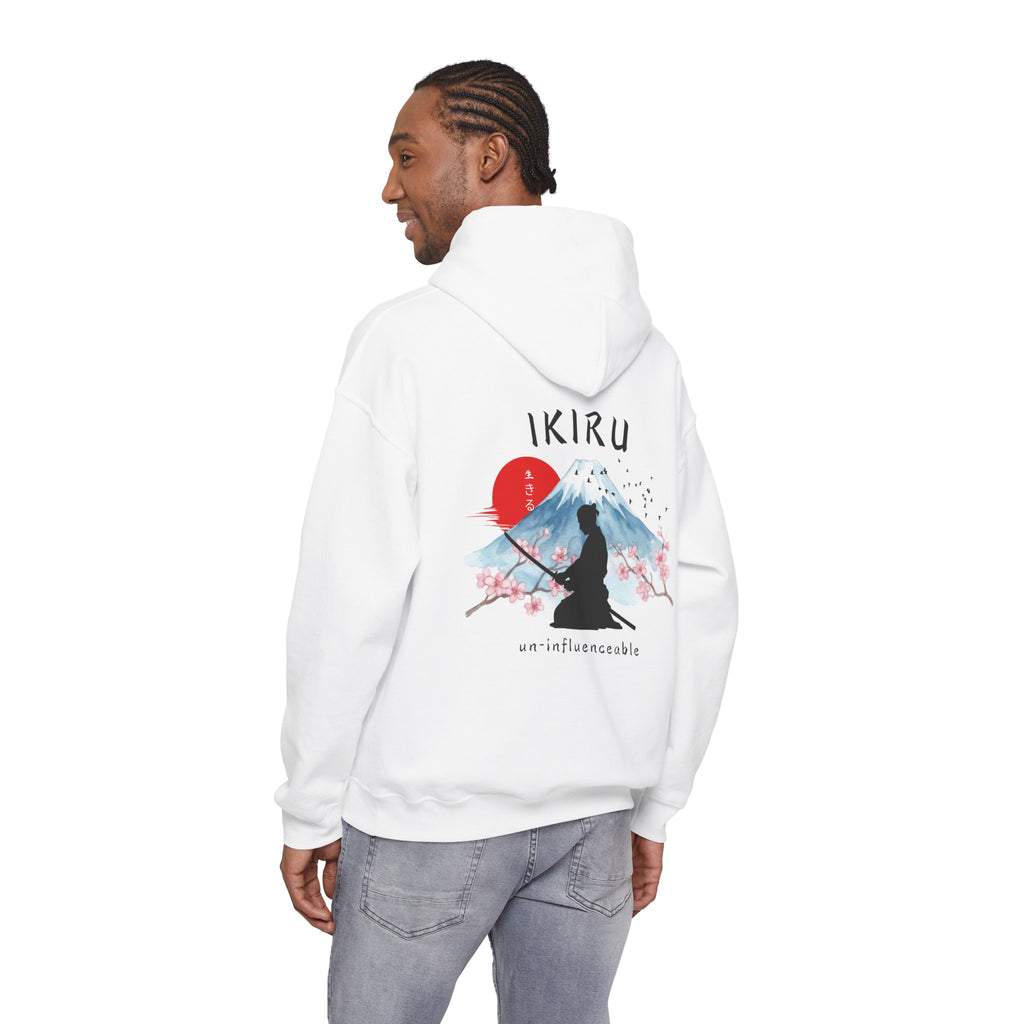 White hoodie with 'IKIRU' and mountain, samurai, and blossom tree design on the back saying 'un-influenceable' against a white background