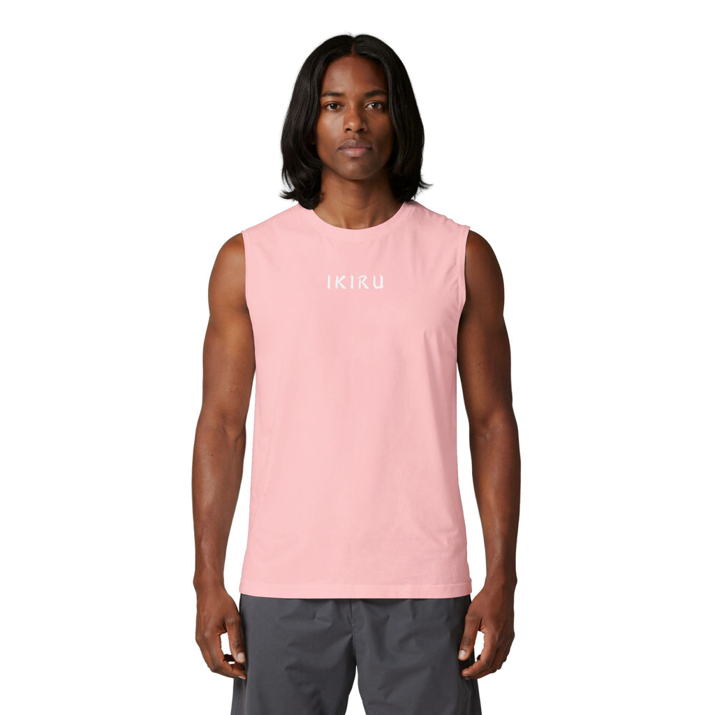 Person wearing a pink sleeveless shirt with a logo on a white background