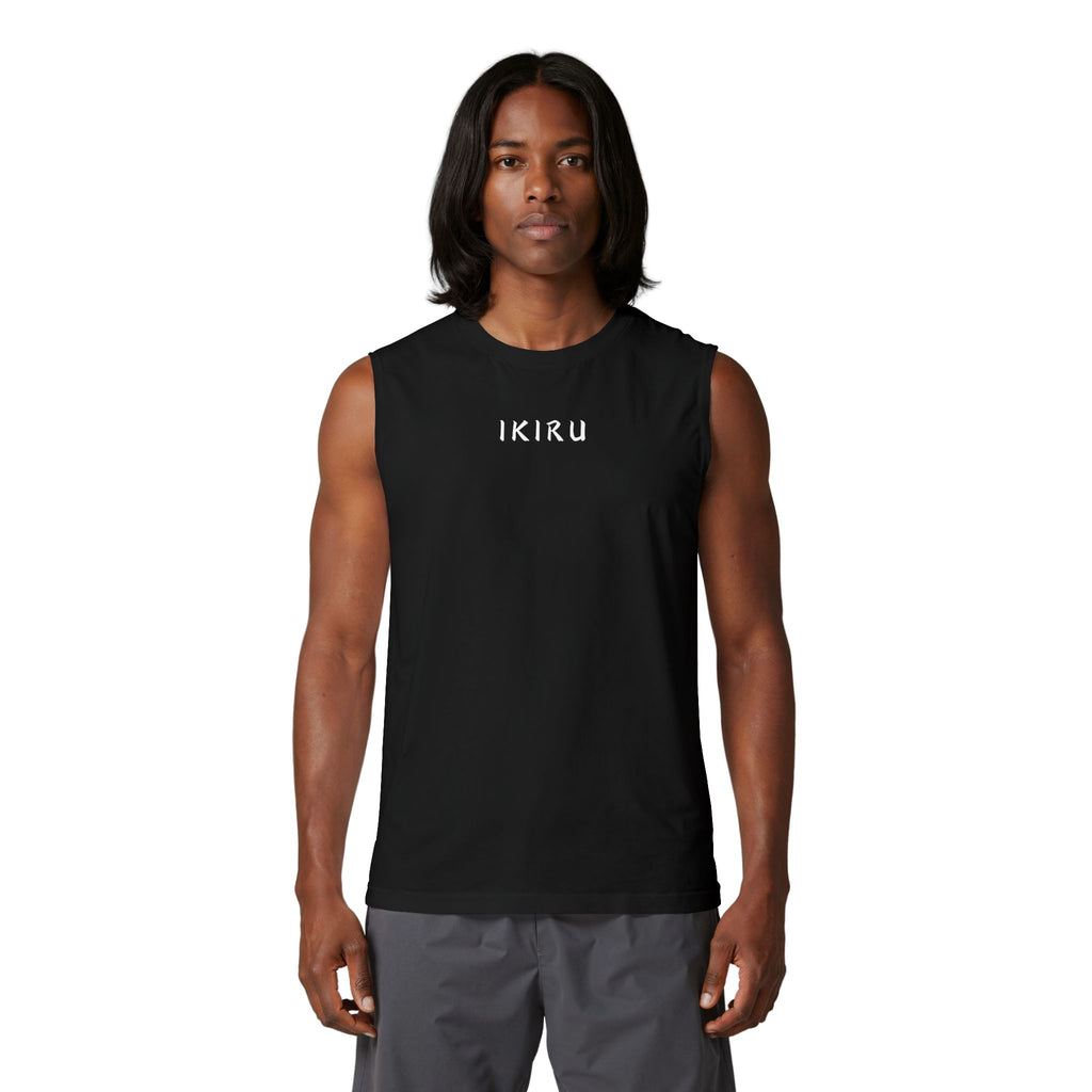 Man wearing a black sleeveless shirt with text on a white background
