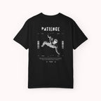 Black t-shirt with white text and graphics on a white background