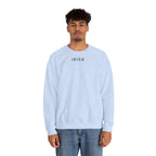Man wearing a light blue ikiru sweatshirt on a white background