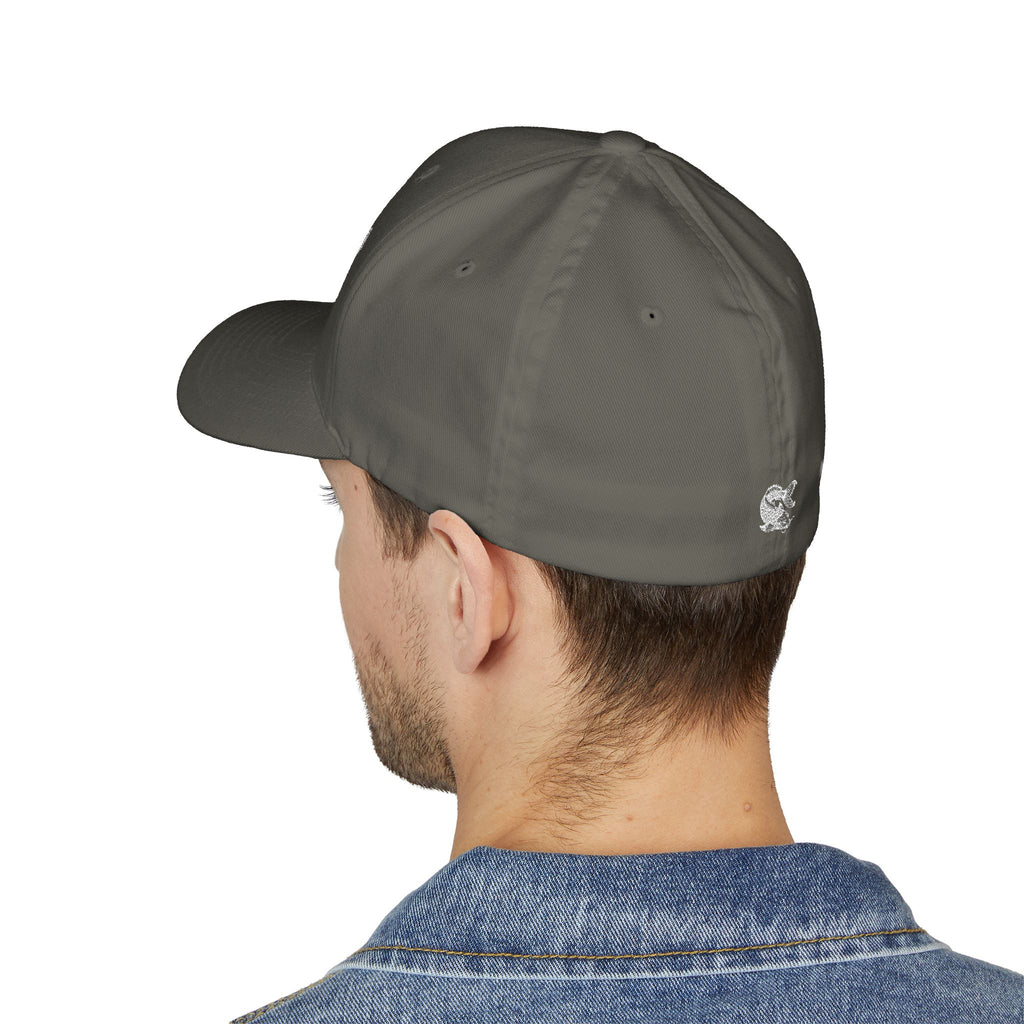 Person wearing a grey closed cap with a logo on a white background