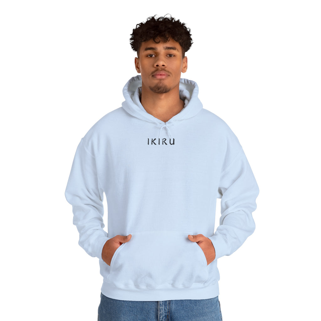 Light blue hoodie with 'IKIRU' and mountain, samurai, and blossom tree design on the back saying 'un-influenceable' against a white background