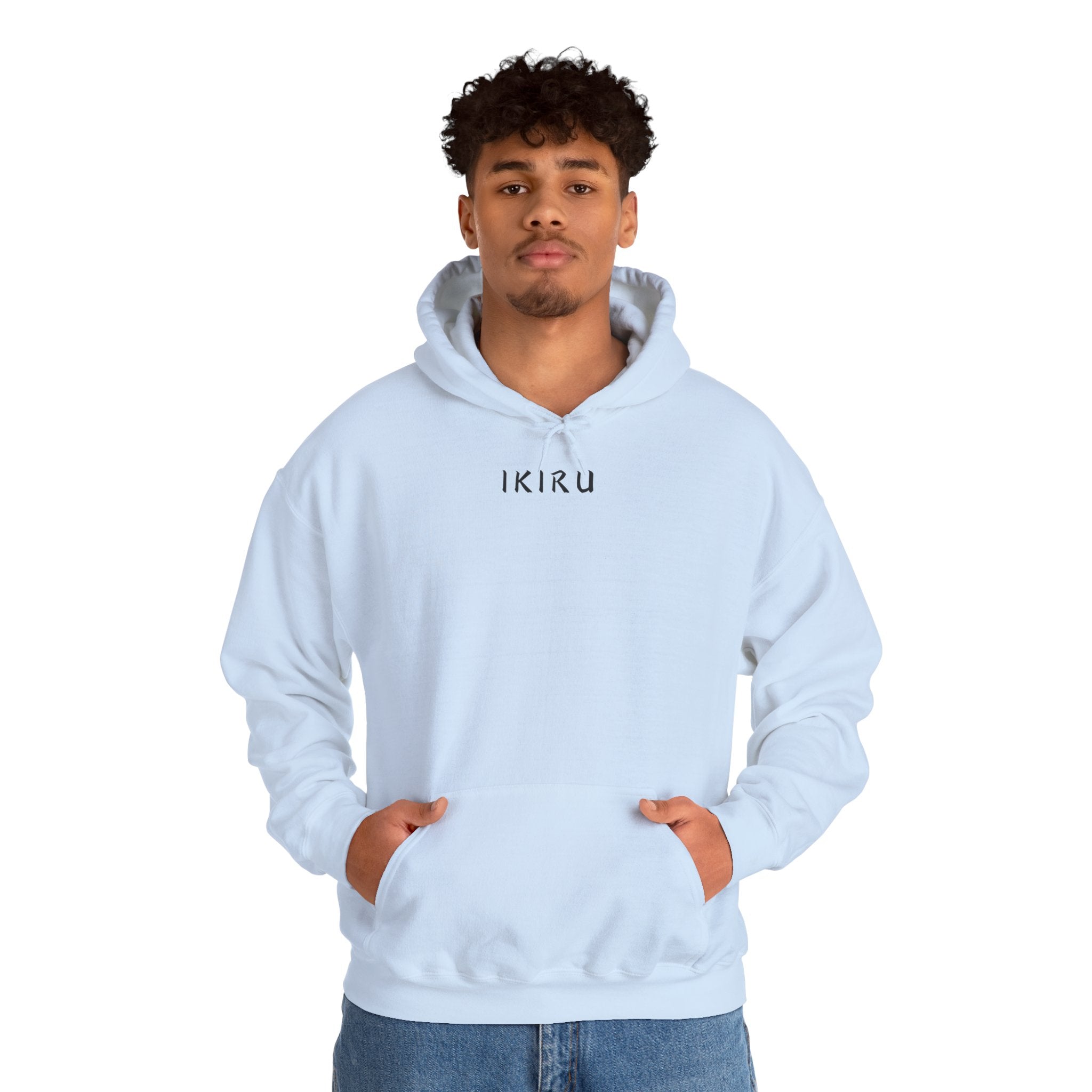 Light blue hoodie with 'IKIRU' and mountain, samurai, and blossom tree design on the back saying 'un-influenceable' against a white background