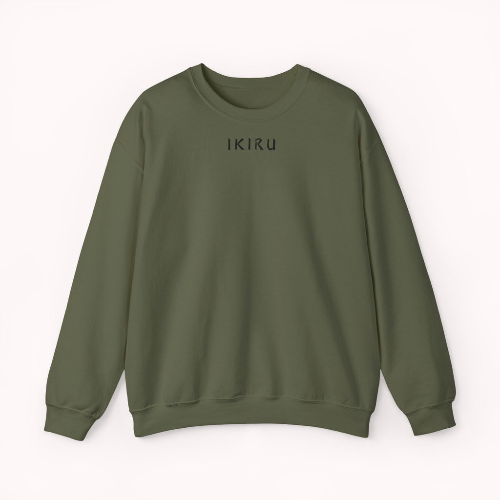 Green sweater with a small ikiru logo on a white background
