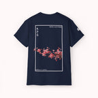 Navy t-shirt with cherry blossom design and 'IKIRU CLOTHING' branding on a white background