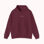 Maroon hoodie with IKIRU logo on a white background