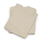Folded beige t-shirt with IKIRU logo on a white background