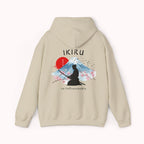 Beige hoodie with 'IKIRU' and mountain, samurai, and blossom tree design on the back saying 'un-influenceable' against a white background