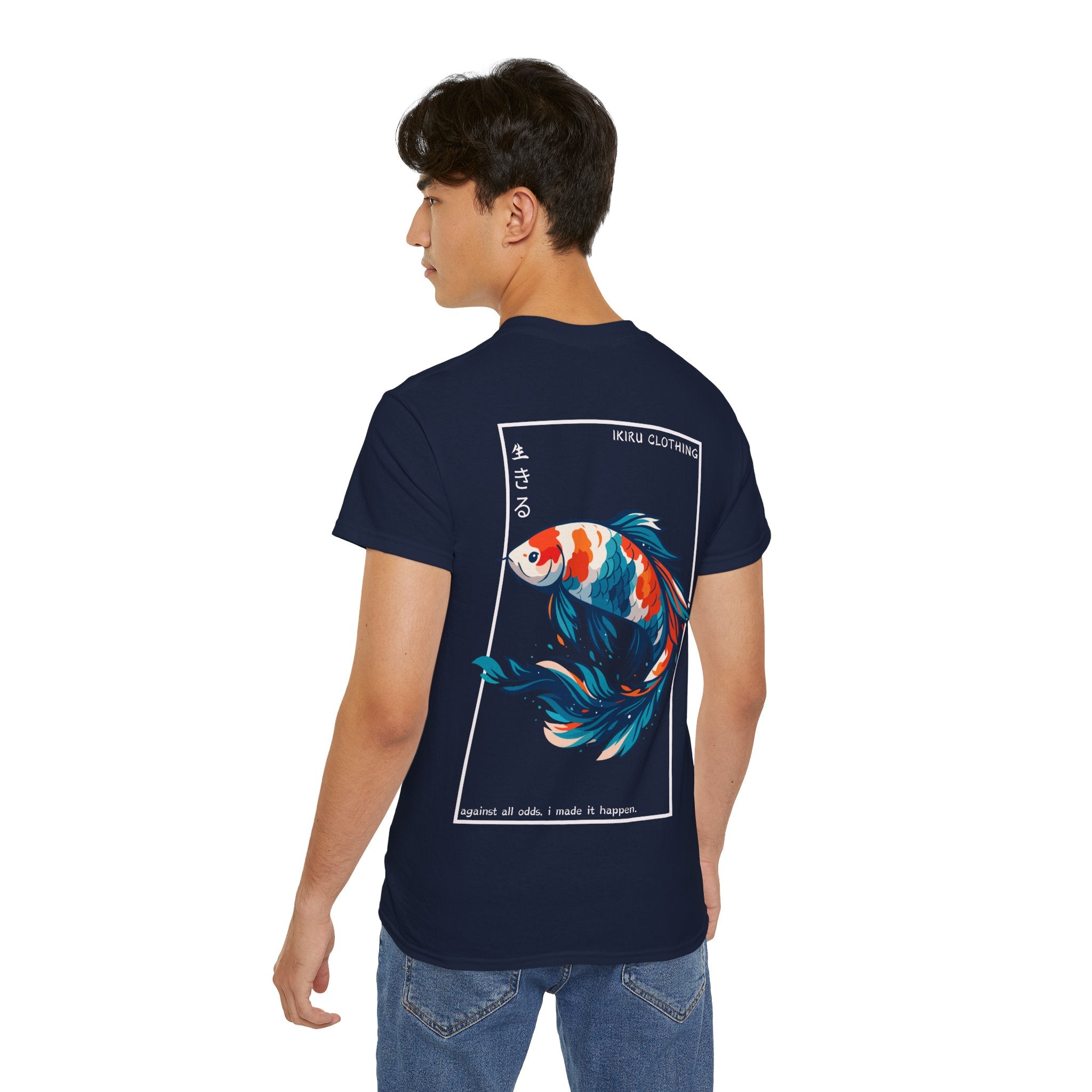 Person wearing a navy t-shirt with a colorful koi fish design and 'IKIRU CLOTHING' branding on a white background