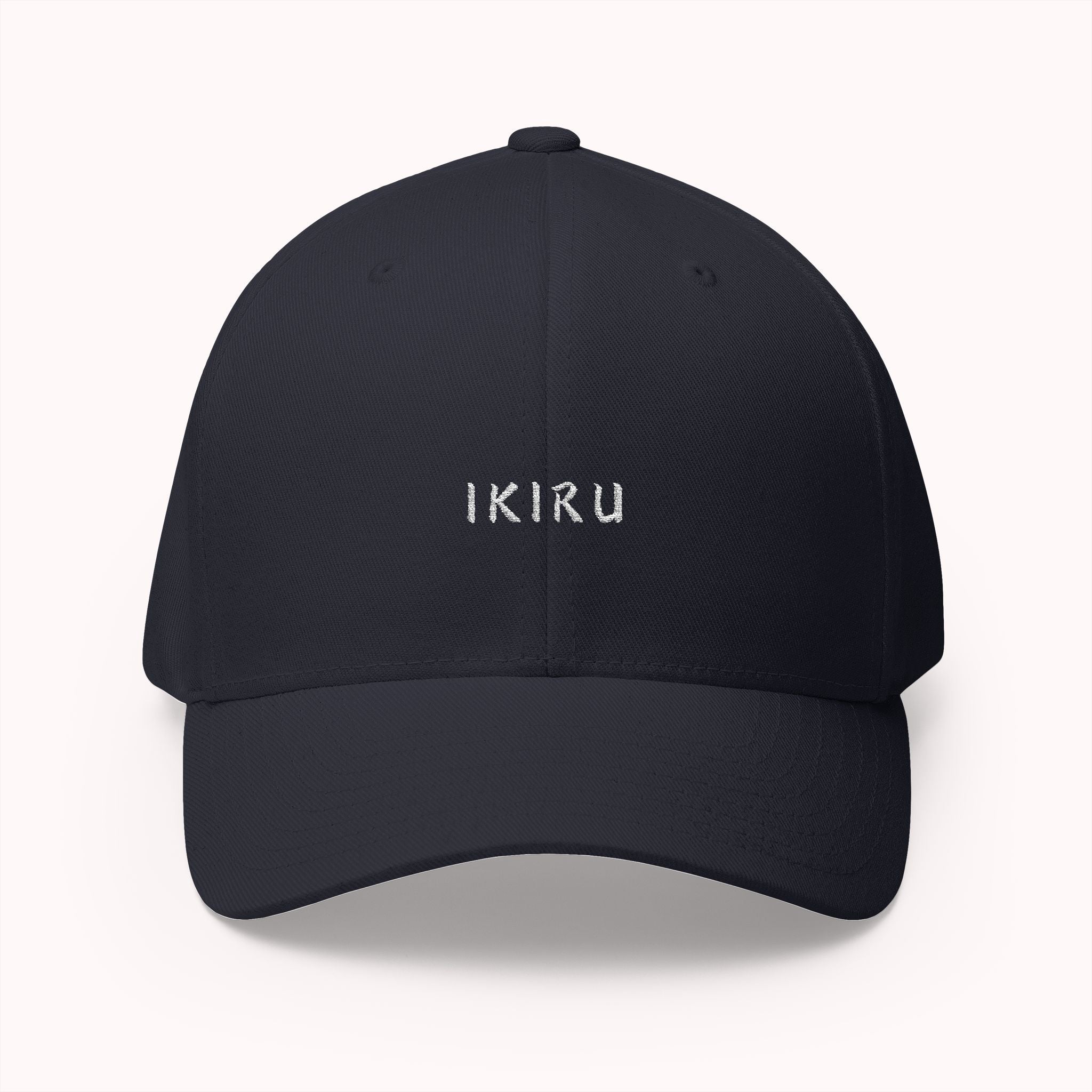 Navy cap with IKIRU branding on a white background