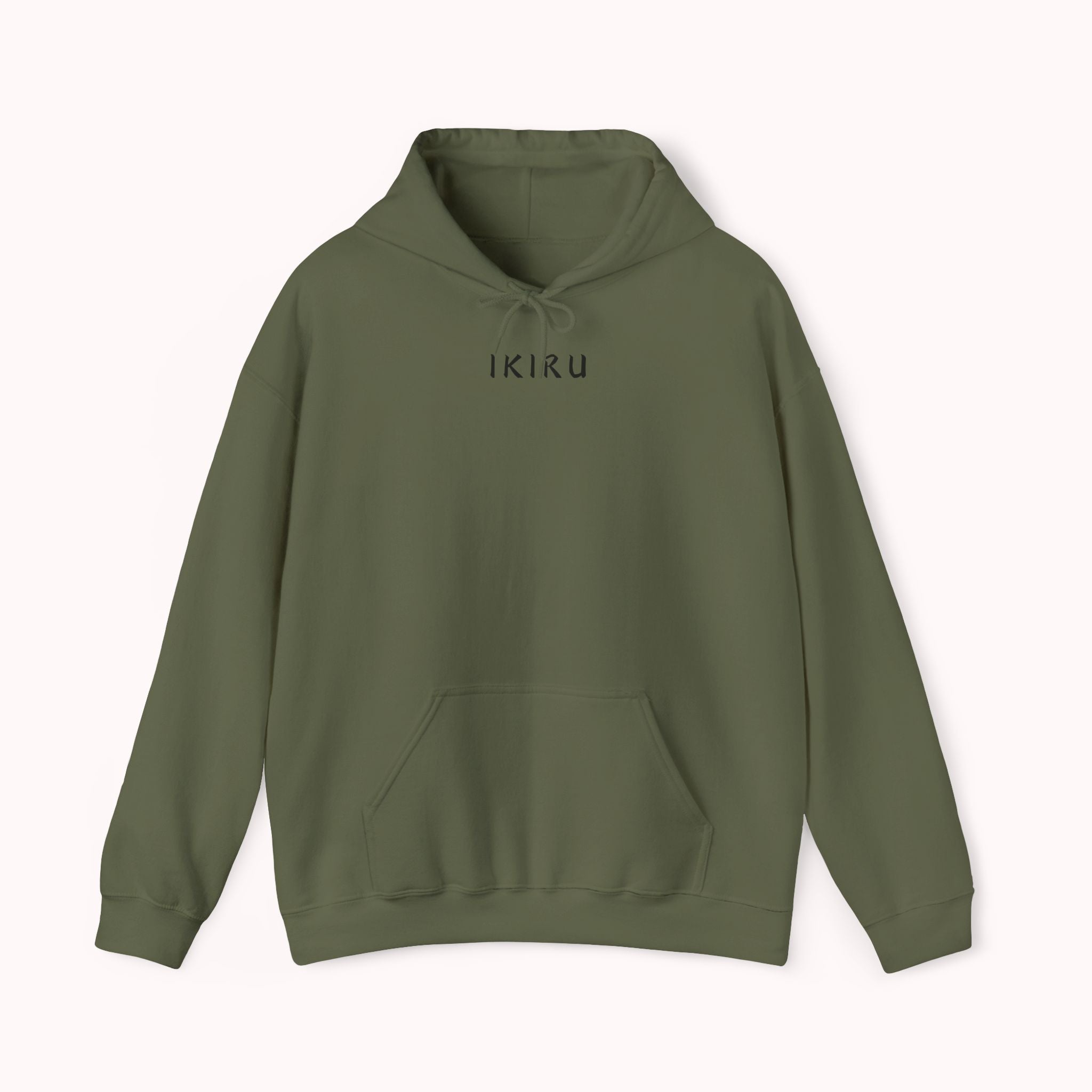 Green hoodie with 'IKIRU' and mountain, samurai, and blossom tree design on the back saying 'un-influenceable' against a white background